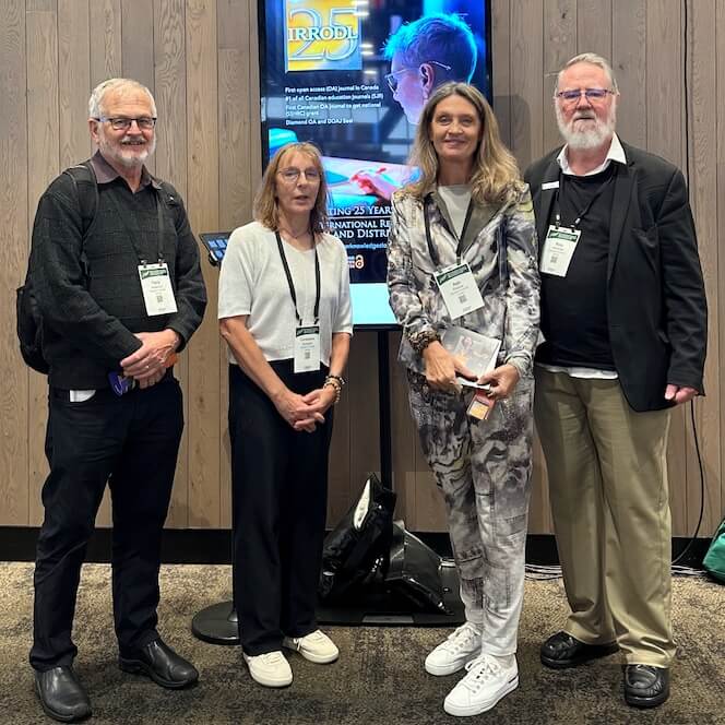 Four of IRRODL's editors at the ICDE conference